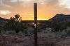 cross with dog tags